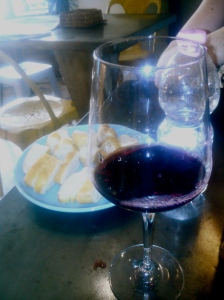 A picture of one of the delicious Chianti red wines that we tried and the delicious plain focaccia behind it :)  